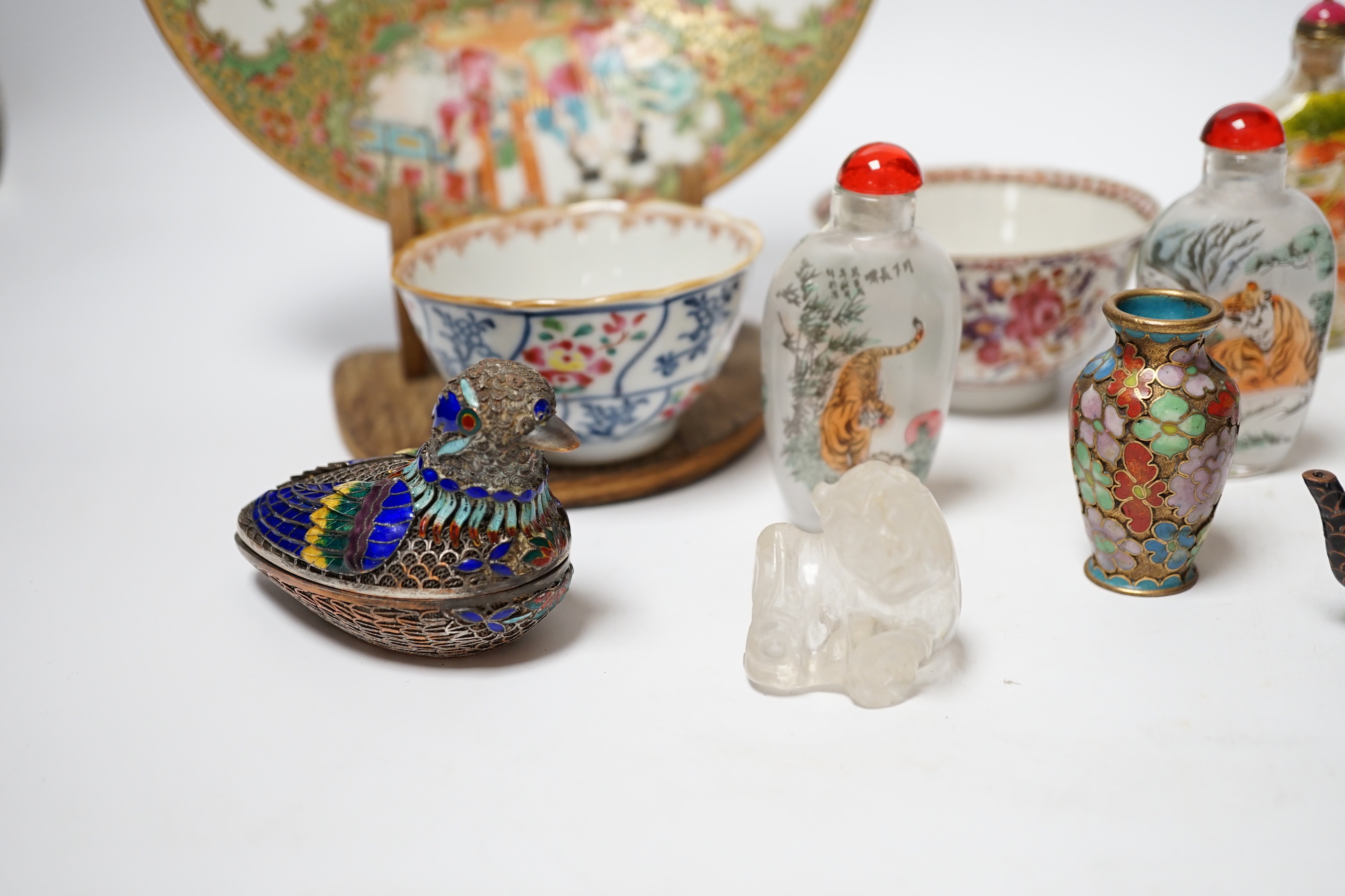 A collection of mixed Chinese scent bottles a famille rose plate and two tea bowls together with various Japanese items